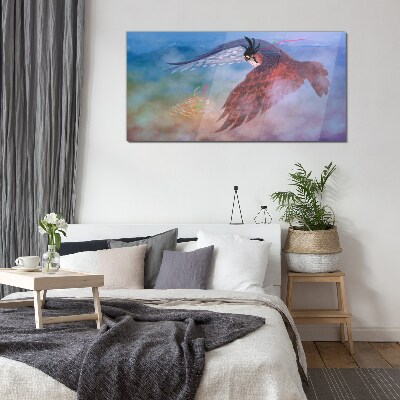 Flight of a bird of prey in the clouds Glass Wall Art