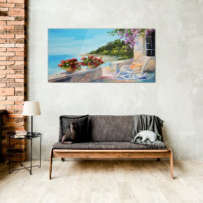 Flowers and sea in a sunny landscape Glass Print