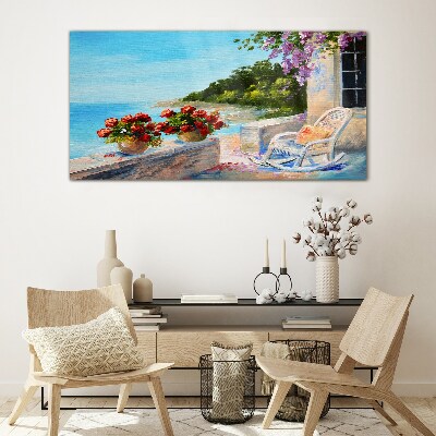 Flowers and sea in a sunny landscape Glass Print
