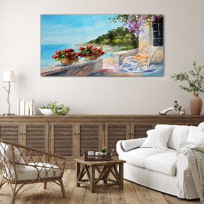 Flowers and sea in a sunny landscape Glass Print