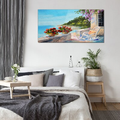 Flowers and sea in a sunny landscape Glass Print