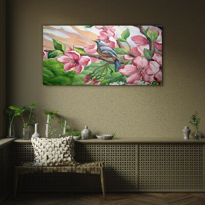 A bird against a background of spring flowers Glass Wall Art