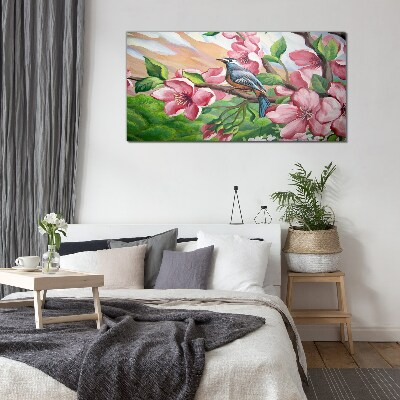 A bird against a background of spring flowers Glass Wall Art