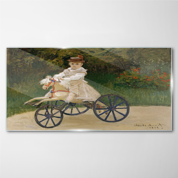 Child on a ride-on Glass Wall Art