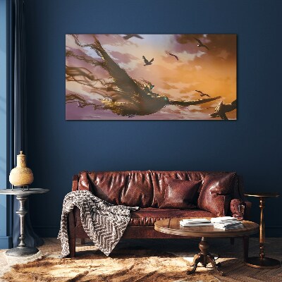 Flight of birds in the setting sun Glass Wall Art
