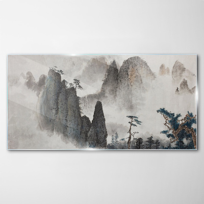 Mountain landscape in a misty landscape Glass Wall Art