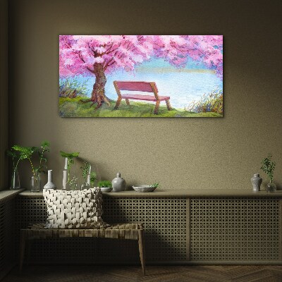 Spring peace under the blossoming cherry tree Glass Wall Art
