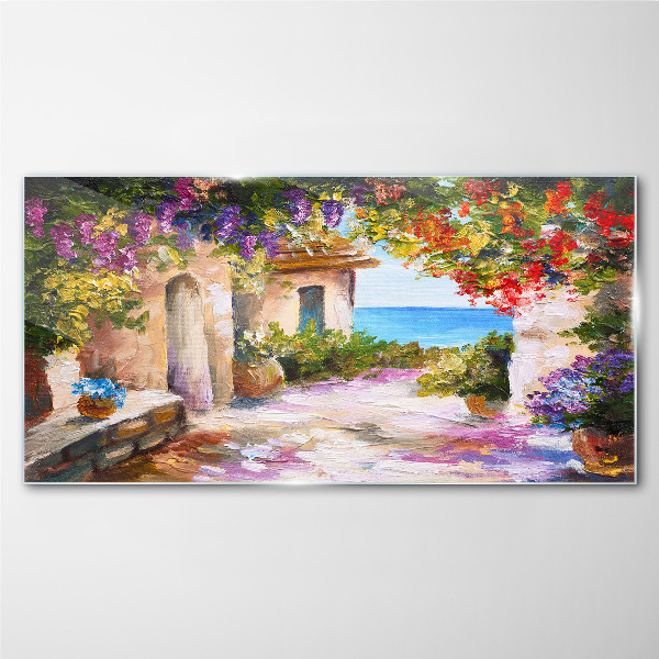 The flower alley of a seaside village Glass Wall Art