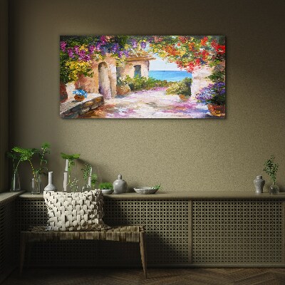 The flower alley of a seaside village Glass Wall Art