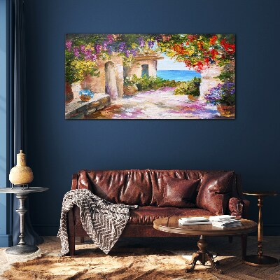 The flower alley of a seaside village Glass Wall Art