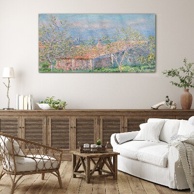 A peaceful landscape with a house and trees Glass Wall Art