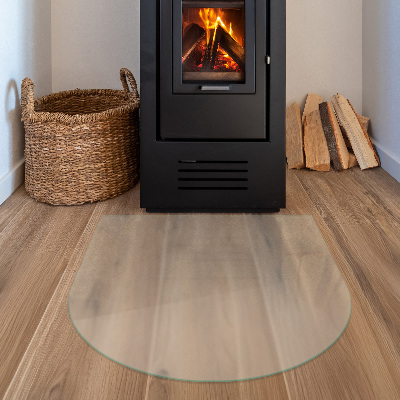 Semi-oval frosted glass hearth for log burner