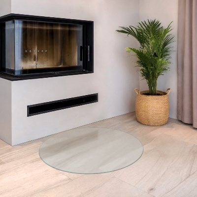 Circular translucent glass fireplace hearth pad