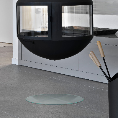 Circular translucent glass fireplace hearth pad