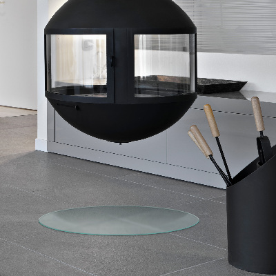 Circular translucent glass fireplace hearth pad
