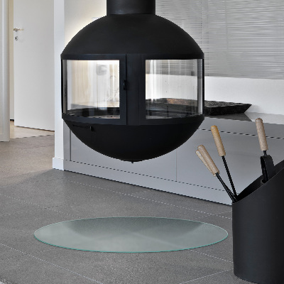 Circular translucent glass fireplace hearth pad