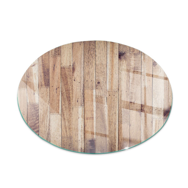 Glass hearth for stove round Wooden board in arrangement