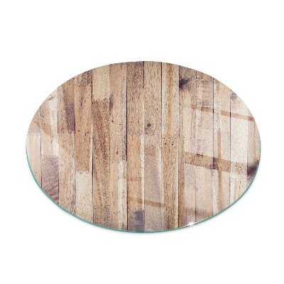 Glass hearth for stove round Wooden board in arrangement