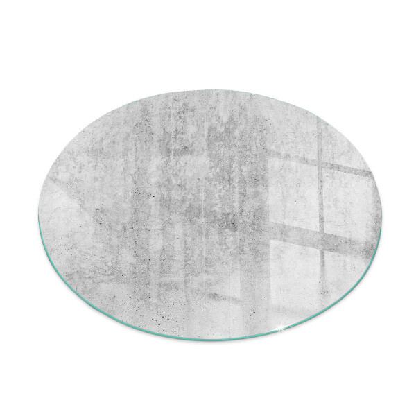 Glass hearth for stove round Raw concrete texture