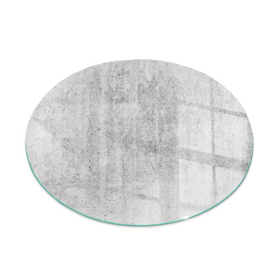 Glass hearth for stove round Raw concrete texture