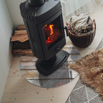 Glass hearth pad round A damaged wooden board