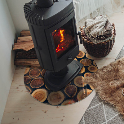 Glass hearth for stove round A box with cut wood
