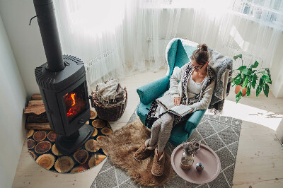 Glass hearth for stove round A box with cut wood