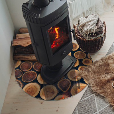 Glass hearth for stove round A box with cut wood