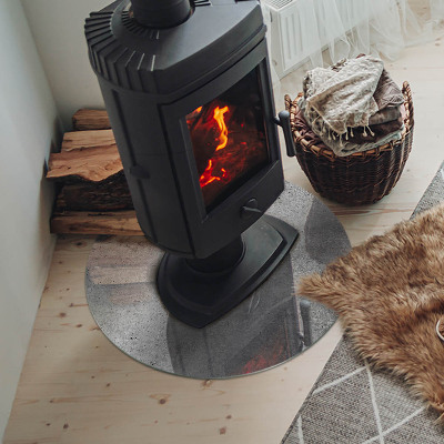 Glass hearth for stove round Raw concrete texture