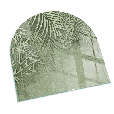 Glass hearths for wood burners Tropical leaves in the background