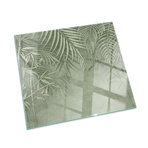 Corner glass hearth rectangular Tropical leaves in the background
