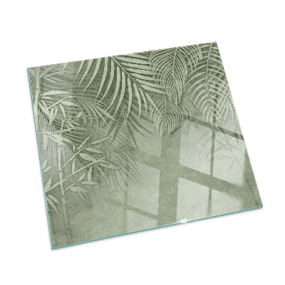 Corner glass hearth rectangular Tropical leaves in the background