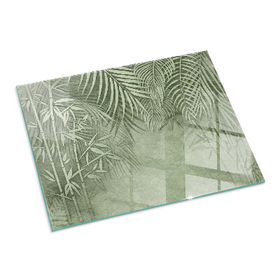 Corner glass hearth rectangular Tropical leaves in the background