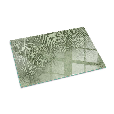 Corner glass hearth rectangular Tropical leaves in the background