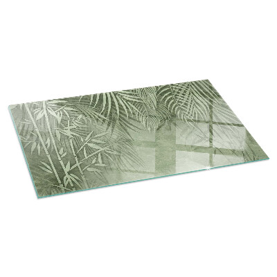 Corner glass hearth rectangular Tropical leaves in the background