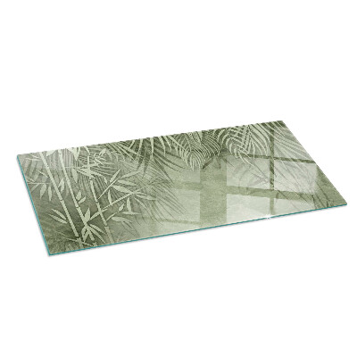 Corner glass hearth rectangular Tropical leaves in the background