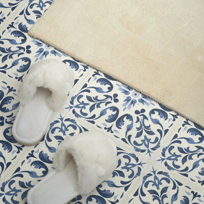 Rectangular wall panel A floral motif in a tiled composition