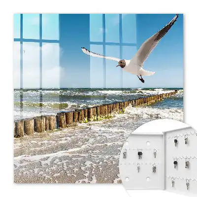 Key cabinet Sea space with a seagull on the beach