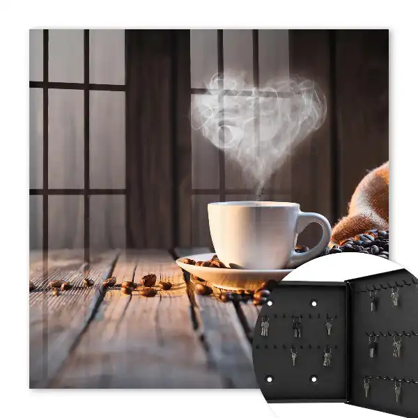 Wall mounted key cabinet Coffee heart on the table