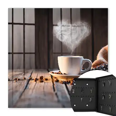 Wall mounted key cabinet Coffee heart on the table