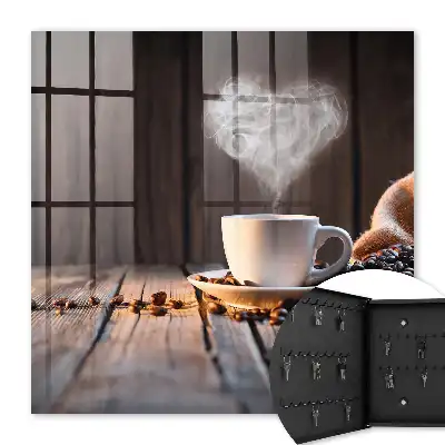 Wall mounted key cabinet Coffee heart on the table