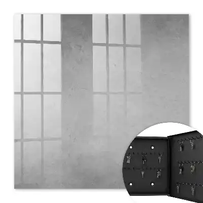 Gray key cabinet with delicate abstract patterns