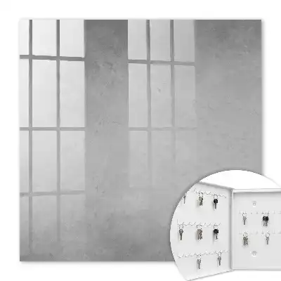 Gray key cabinet with delicate abstract patterns