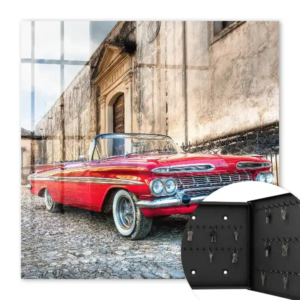 Decorative key box Retro car against the background of architecture