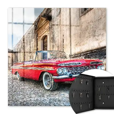 Decorative key box Retro car against the background of architecture