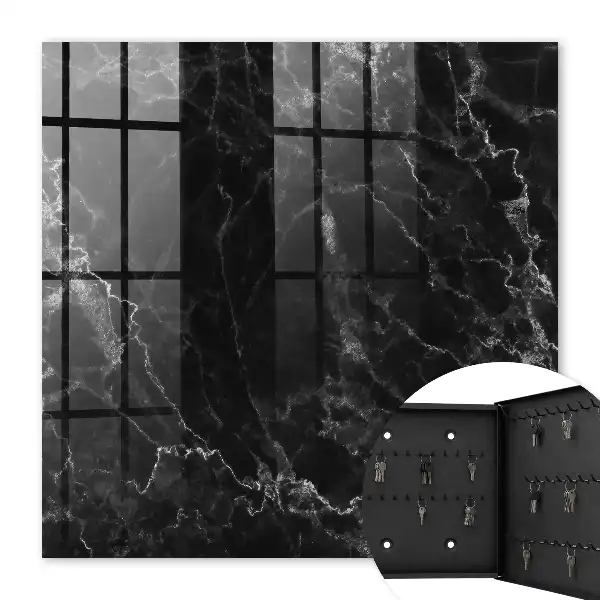 Key cabinet with a black and white marble pattern