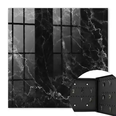 Key cabinet with a black and white marble pattern