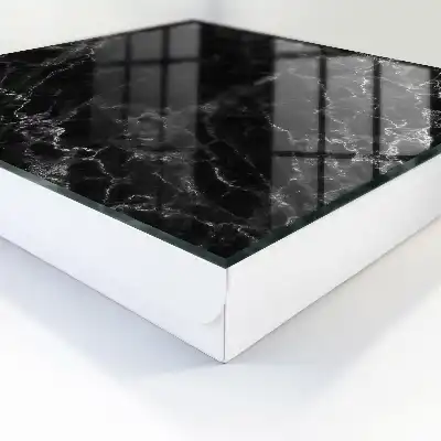 Key cabinet with a black and white marble pattern