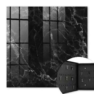 Key cabinet with a black and white marble pattern