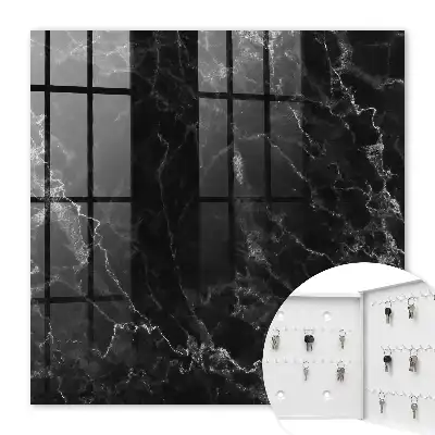 Key cabinet with a black and white marble pattern